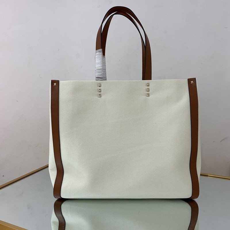 入手困難ヴァレンティノ トートバッグ コピー ショッピングバッグ NEON VLTN キャンバス ミディアム Vui76345通販