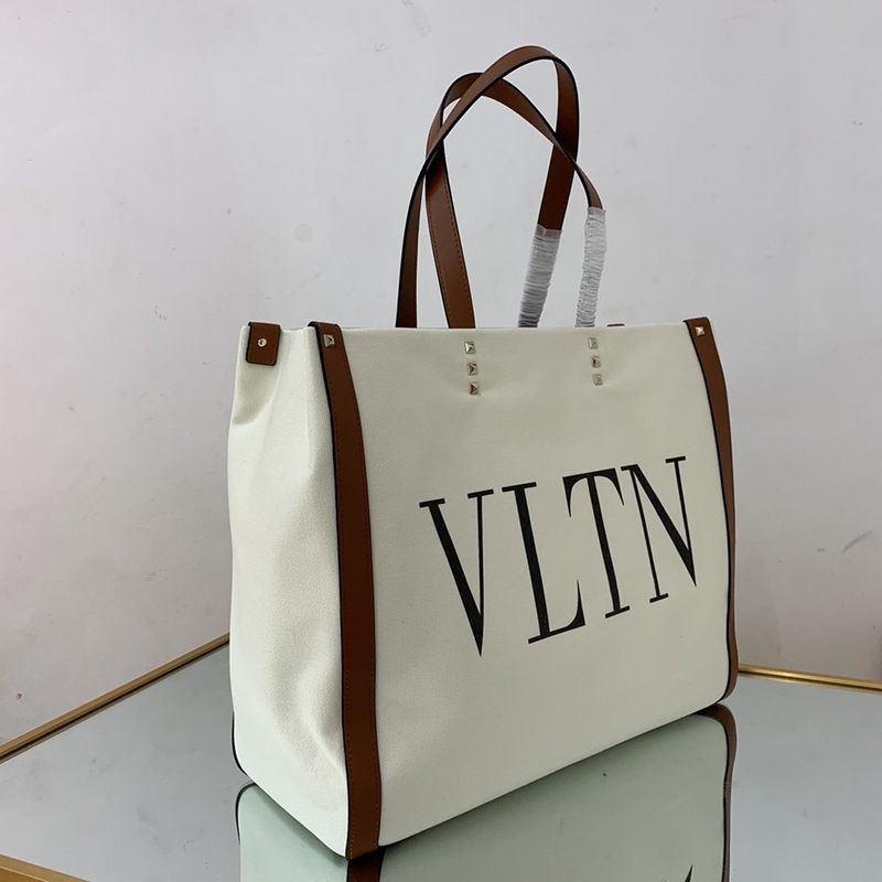 入手困難ヴァレンティノ トートバッグ コピー ショッピングバッグ NEON VLTN キャンバス ミディアム Vui76345激安送料無料