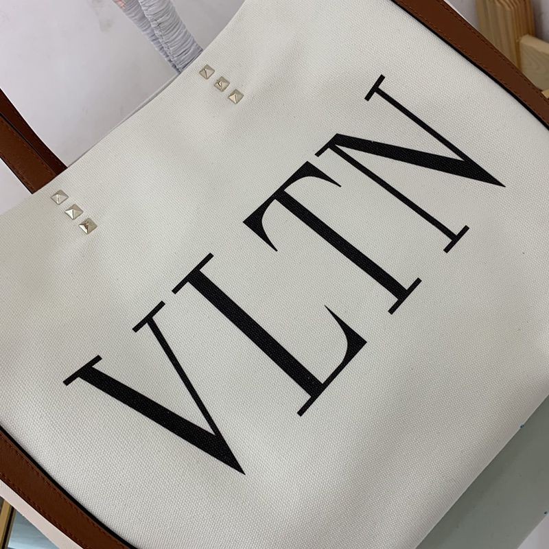 入手困難ヴァレンティノ トートバッグ コピー ショッピングバッグ NEON VLTN キャンバス ミディアム Vui76345人気