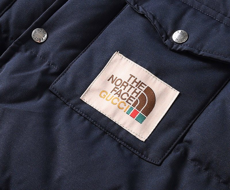 稀少 2021 コラボ グッチ ノースフェイス コピー ダウンベスト ネイビー Noc49383代引きを販売