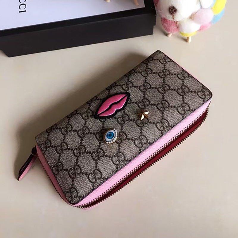 グッチ GGスプリーム フェイスモチーフ 偽物ラウンドファスナー 長財布 431392人気