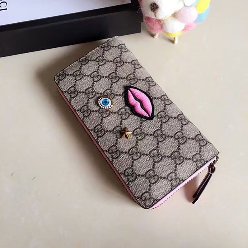 グッチ GGスプリーム フェイスモチーフ 偽物ラウンドファスナー 長財布 431392代引きを販売