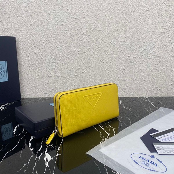 稀少プラダ サフィアーノエンボスレザー ジップアラウンド長財布 偽物 イエロー puw35402通販