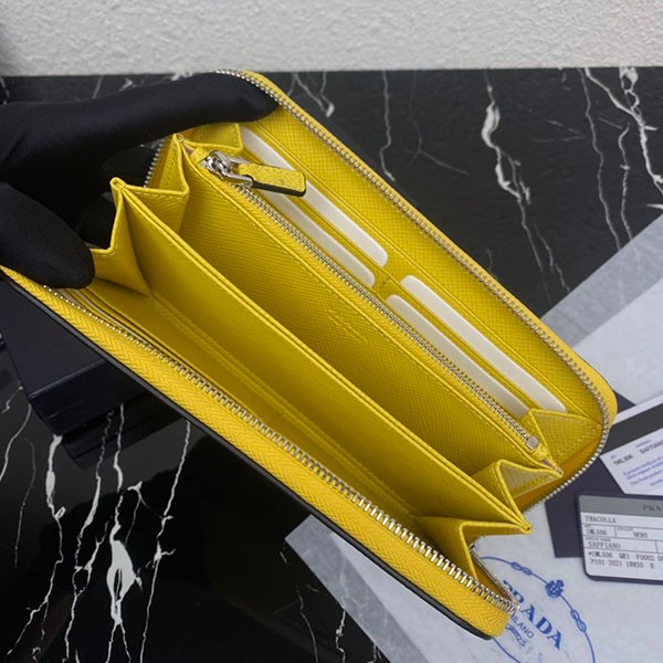 稀少プラダ サフィアーノエンボスレザー ジップアラウンド長財布 偽物 イエロー puw35402代引きを販売