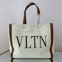 入手困難ヴァレンティノ トートバッグ コピー ショッピングバッグ NEON VLTN キャンバス ミディアム Vui76345