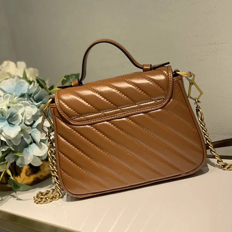 n級品 おすすめグッチ 偽物 ミニ トップハンドルバッグ GGマーモント 5835710OLFT2535
