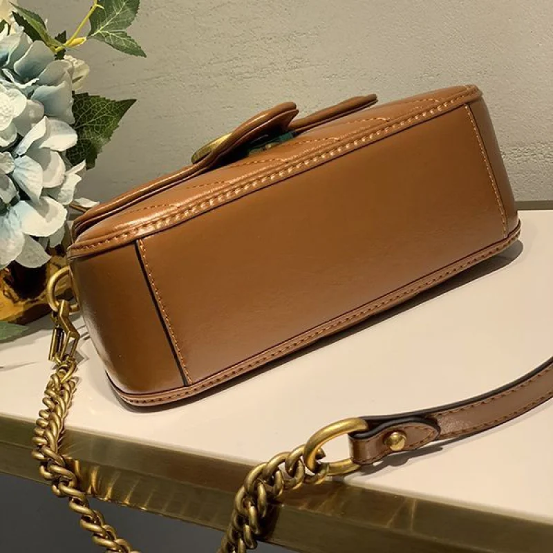 n級品 おすすめグッチ 偽物 ミニ トップハンドルバッグ GGマーモント 5835710OLFT2535