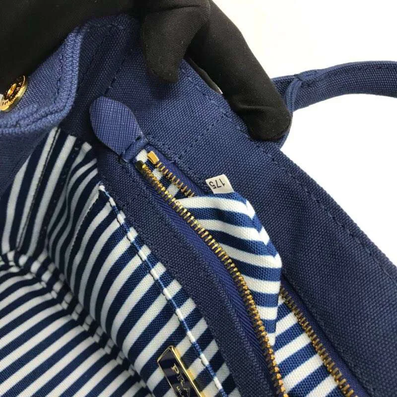 [プラダ] カナパ x レザー トートバッグ 偽物 / ショッピングバッグ puw75591