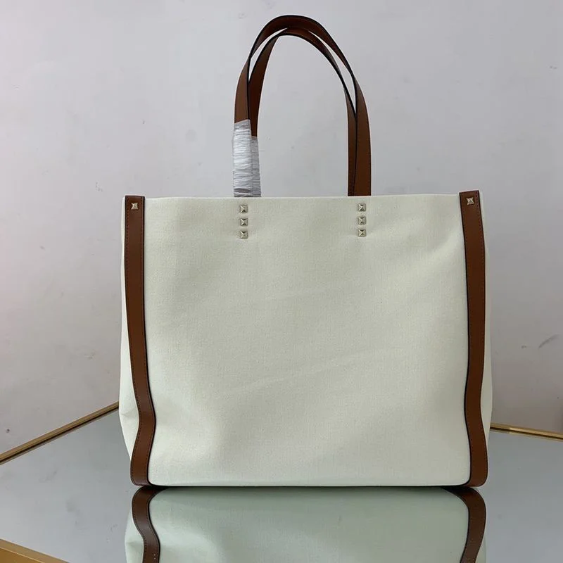 入手困難ヴァレンティノ トートバッグ コピー ショッピングバッグ NEON VLTN キャンバス ミディアム Vui76345
