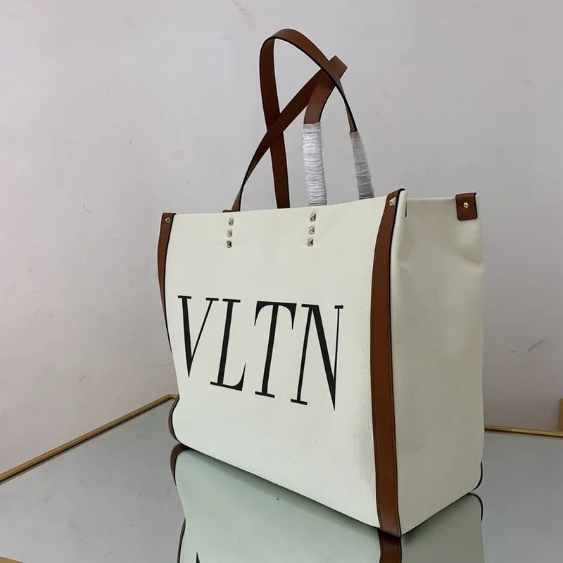 入手困難ヴァレンティノ トートバッグ コピー ショッピングバッグ NEON VLTN キャンバス ミディアム Vui76345