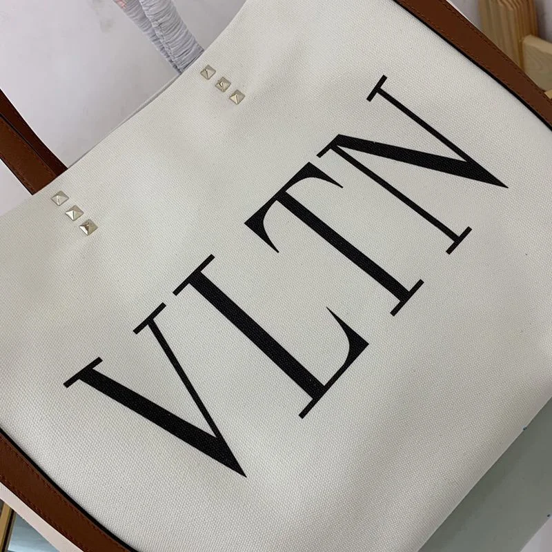入手困難ヴァレンティノ トートバッグ コピー ショッピングバッグ NEON VLTN キャンバス ミディアム Vui76345