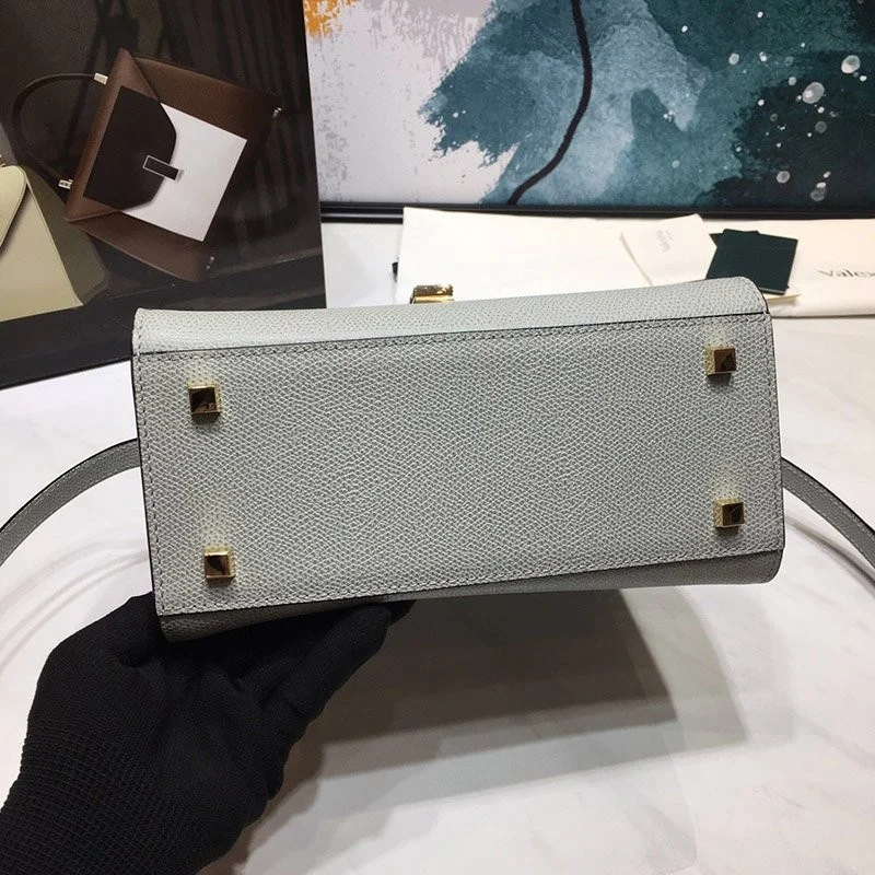 可愛い ヴァレクストラ 偽物 iside イジィデ ミニ ハンドバッグ Vus38627