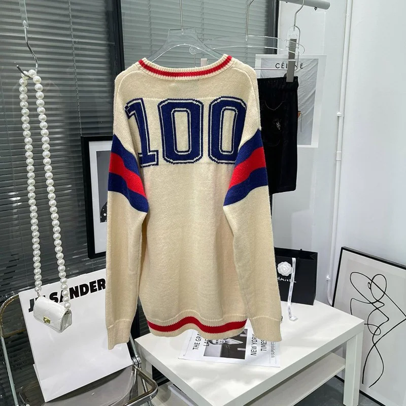 目を惹くカラー グッチ 100周年 セーター ウール 偽物 トップス ロゴ プレタ gur83620