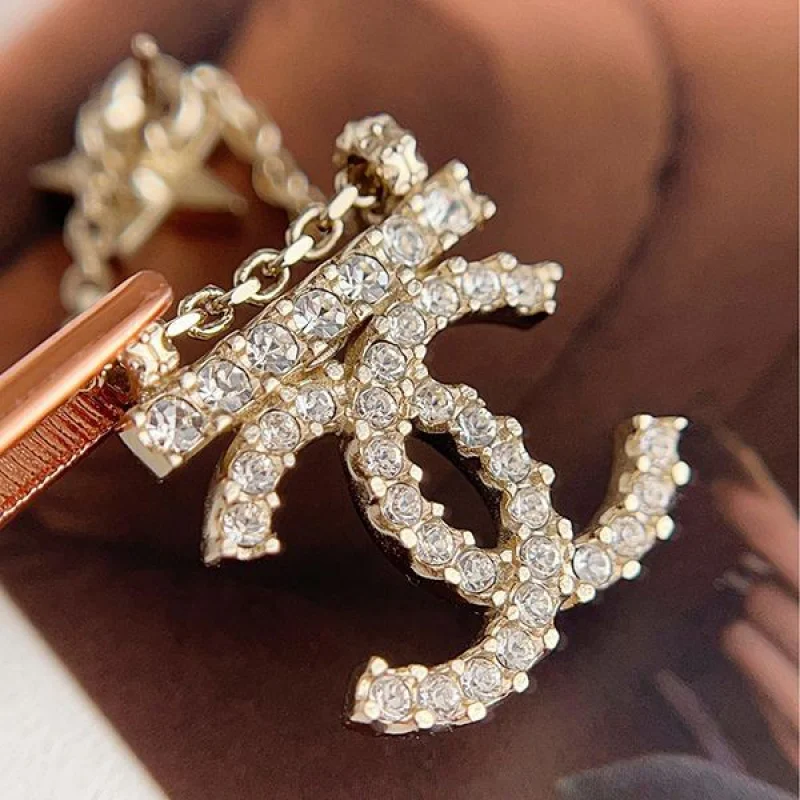 定番シャネル スイング ピアス コピー CCロゴ スター クリスタル ゴールド AB8068B07810NH432