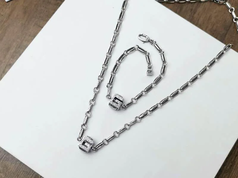 最安値挑戦 グッチ ブレスレット Gキューブ シルバー バイオレット オレンジ gub57479
