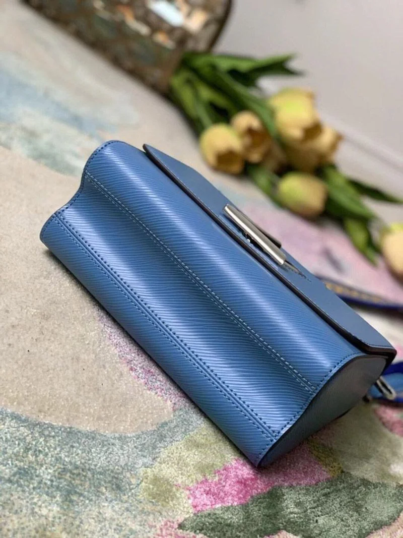 ルイヴィトンハンドバッグブラック偽物 ツイストMM バッグ モノグラム M57057