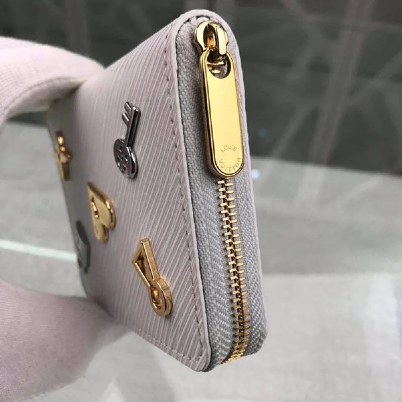 ルイヴィトン 折り財布コピー エピ ラブロック ジッピーコインパース ブロン レディース M63994