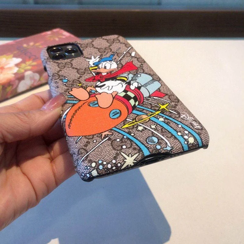 大人気!!新色グッチ ディズニーコラボ ドナルドダック iPhoneケース 偽物 gub66546