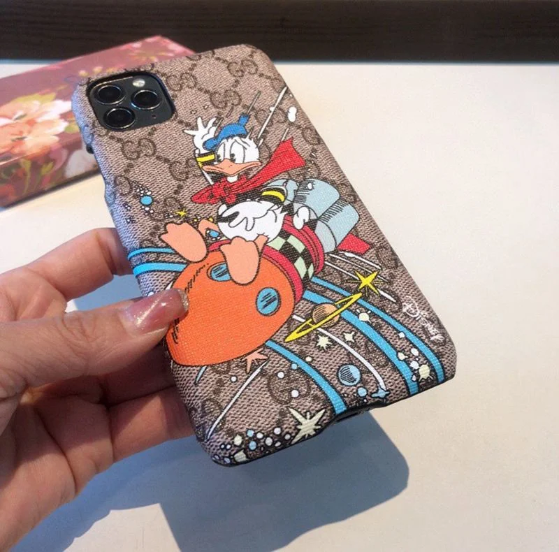 大人気!!新色グッチ ディズニーコラボ ドナルドダック iPhoneケース 偽物 gub66546