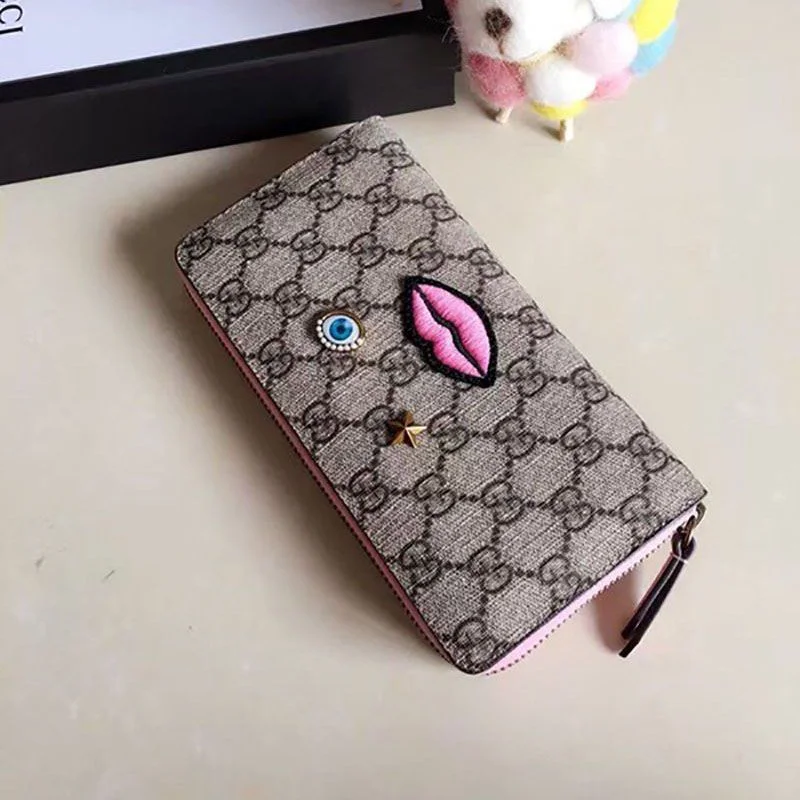 グッチ GGスプリーム フェイスモチーフ 偽物ラウンドファスナー 長財布 431392