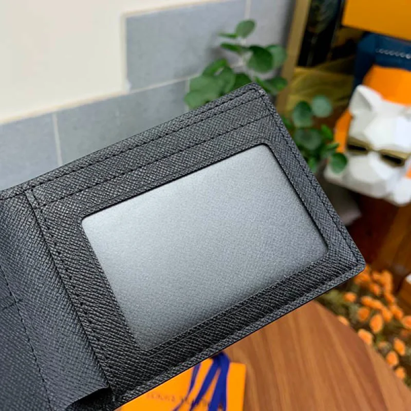 大人気!!新色ルイヴィトン タイガ ポルトフォイユアメリゴ NM コピー 二つ折り財布 ブラック M64005