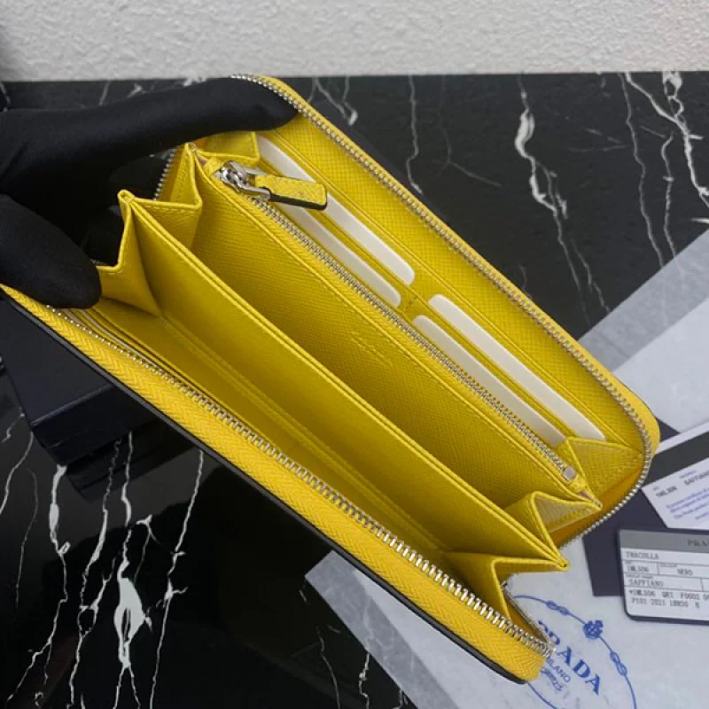 稀少プラダ サフィアーノエンボスレザー ジップアラウンド長財布 偽物 イエロー puw35402